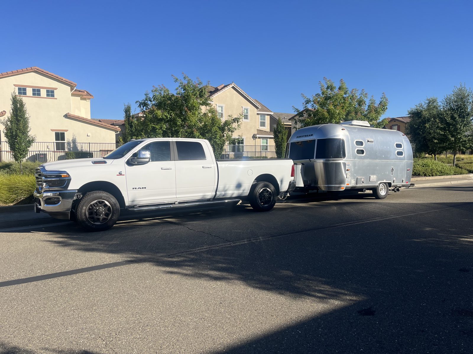 Airstream travel trailer behind a dually pickup, both bought in one deal